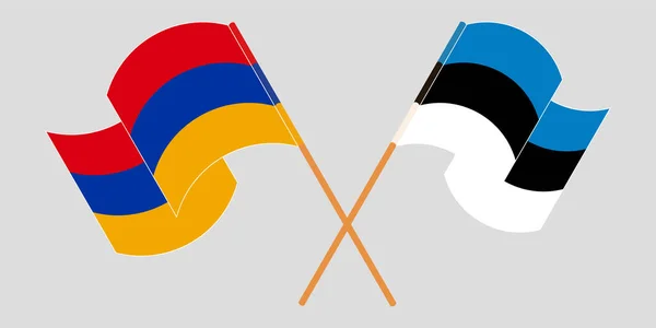 Gekruiste en wapperende vlaggen van Armenië en Estland — Stockvector