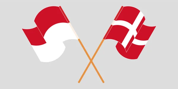 Banderas cruzadas y ondeantes de Indonesia y Dinamarca — Vector de stock