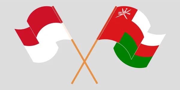 Omans och Indonesiens flagga korsas och viftas — Stock vektor
