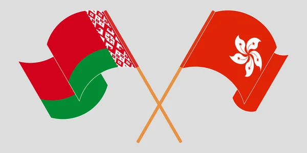 Banderas cruzadas y ondeantes de Bielorrusia y Hong Kong — Vector de stock