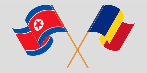 Перехрещені й розмахуючі прапори Північної Кореї й Румунії — стоковий вектор