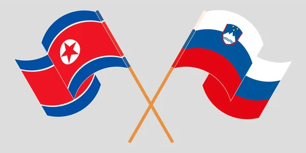 Gekreuzte und wehende Fahnen Nordkoreas und Sloweniens — Stockvektor