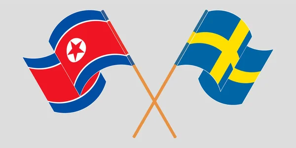 Banderas cruzadas y ondeantes de Corea del Norte y Suecia — Archivo Imágenes Vectoriales