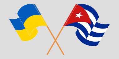 Çapraz ve dalgalı Küba ve Ukrayna bayrakları