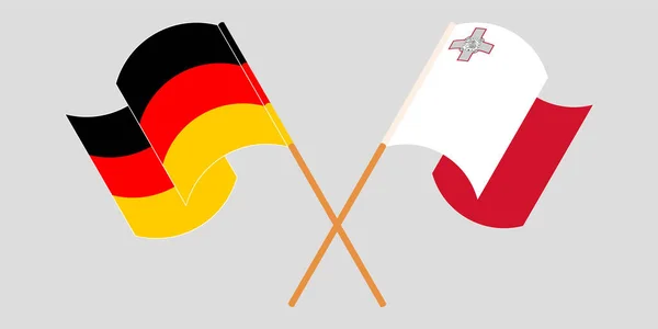 Banderas cruzadas y ondeando de Malta y Alemania — Vector de stock