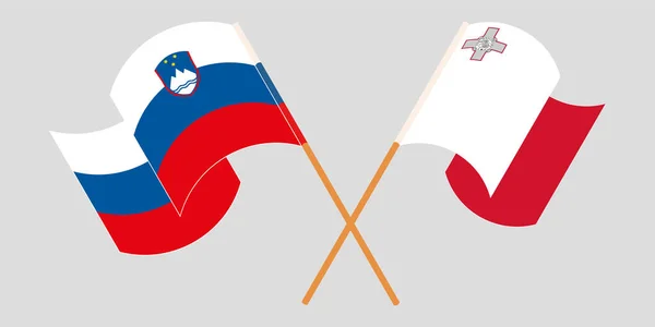 Bandeiras cruzadas e onduladas de Malta e da Eslovénia — Vetor de Stock