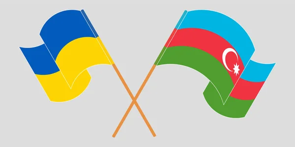 Crossed and waving flags of the Ukraine and Azerbaijan — 图库矢量图片