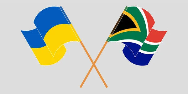 Drapeaux croisés et agités de l'Ukraine et de la République d'Afrique du Sud — Image vectorielle