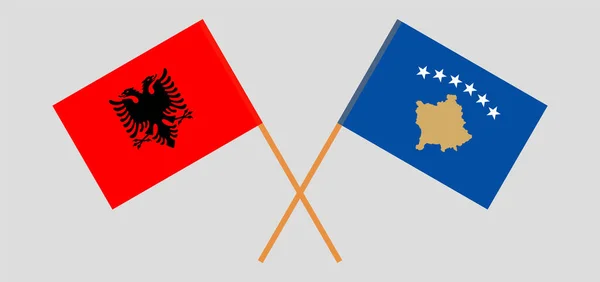 Перехрещені прапори Косово та Албанії — стоковий вектор