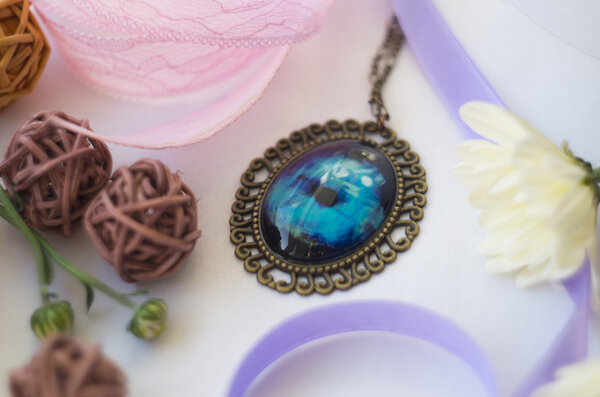 blue decorated pendant