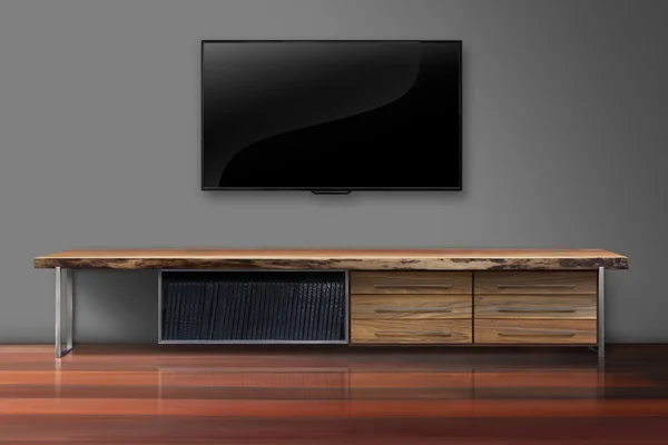 TV gri renk duvarda ahşap masa oturma odası ile açtı.