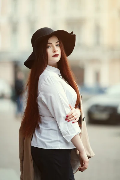 Portrait of young beautiful lady wearing stylish classic clothes posing on the street. Girl looking at camera. Plus size model. Female fashion concept. Close up. Toned — Stock Photo, Image