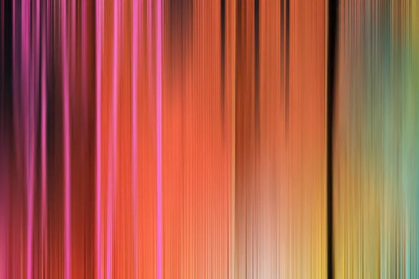 Abstract gradient colored background blurred in motion.
