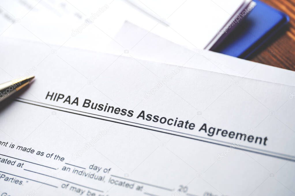 Legal document HIPAA Business Associate Agreement on paper close up.