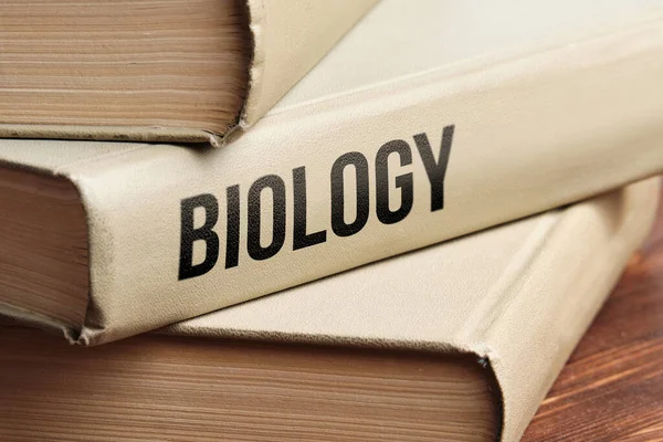 Biology subject book concept on a wooden table for learning