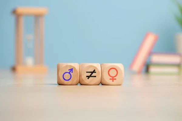 Gender inequality concept with feminine and masculine icons.