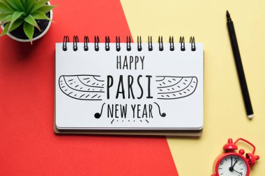 Holiday parsi new year drawn on a notebook.