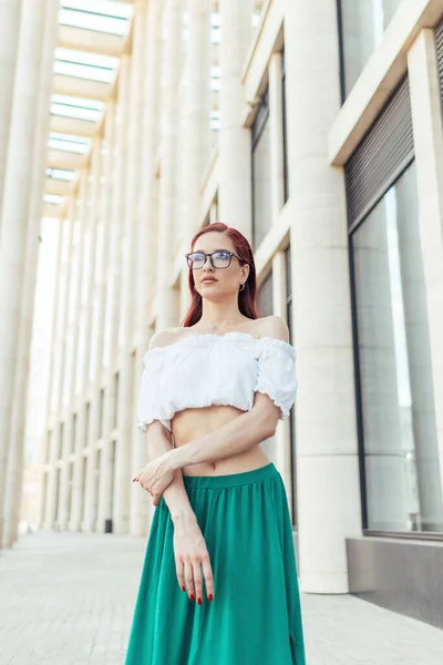 Red Haired Girl Glasses Stands Background Beautiful Modern Building — Stock Photo, Image