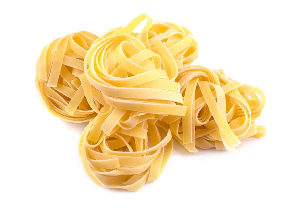 Pasta secca su fondo bianco — Foto Stock