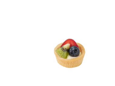 Mini fruit tart, a close up of homemade small tart pie with strawberry, blueberry and kiwi topping isolated on white background.
