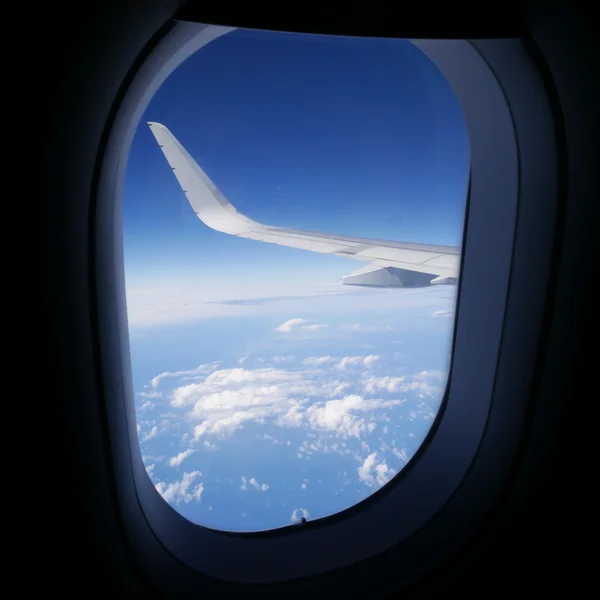 View of blue sky from airplane window. (1) — Stock Photo, Image