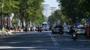 Ho Chi Minh / Saygon, Vietnam - 2015: Sokaklar meşgul Asya şehir hayatı yavaş hareket
