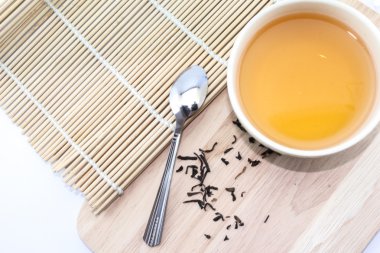 Kaşık ile bir fincan çay