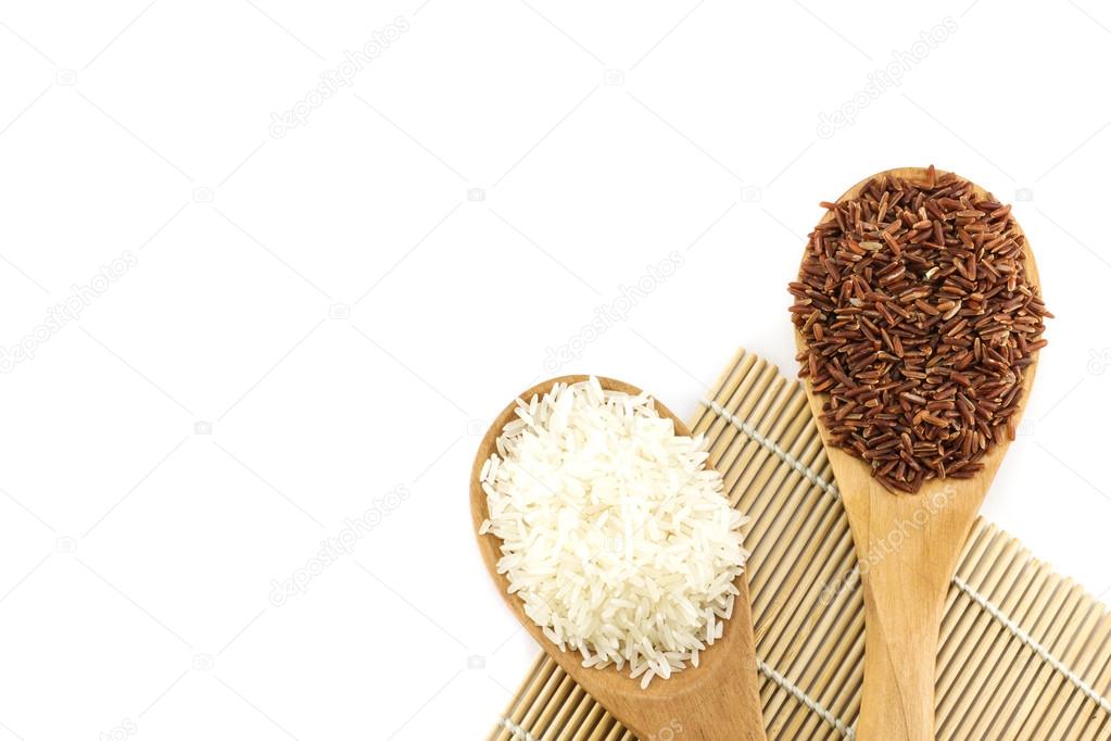 white rice and red rice in wooden spoon