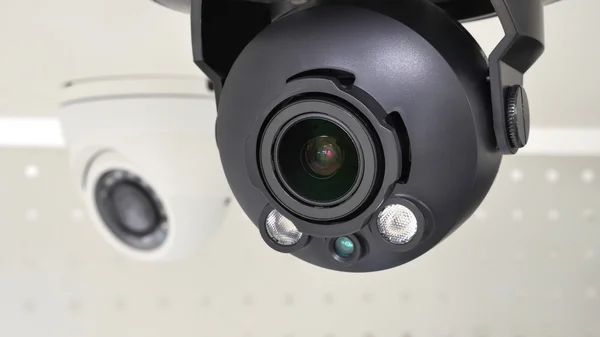 Surveillance camera on the background of the second camera — Stock Photo, Image