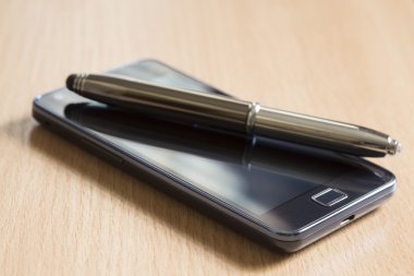 cep telefonu ve kalem 
