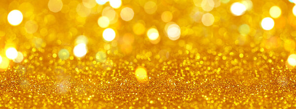 Yellow glitter abstract light background
