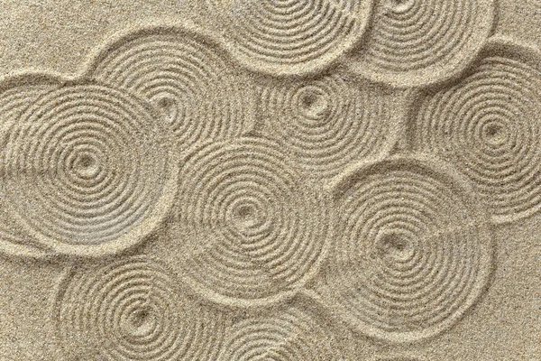 Zen pattern in brown sand