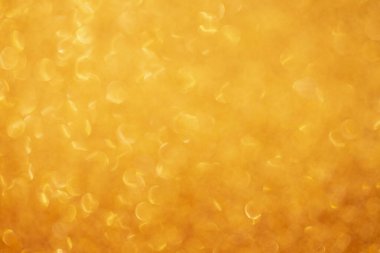 Altın parıltısı soyut ışık arkaplanı