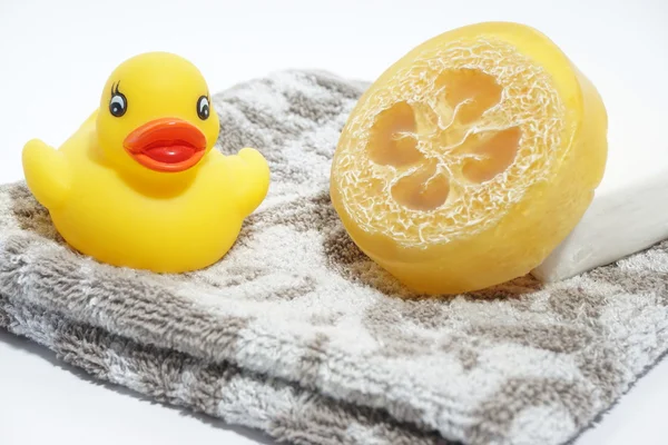 Rubber duckies in a soap bowl — Stock Photo, Image