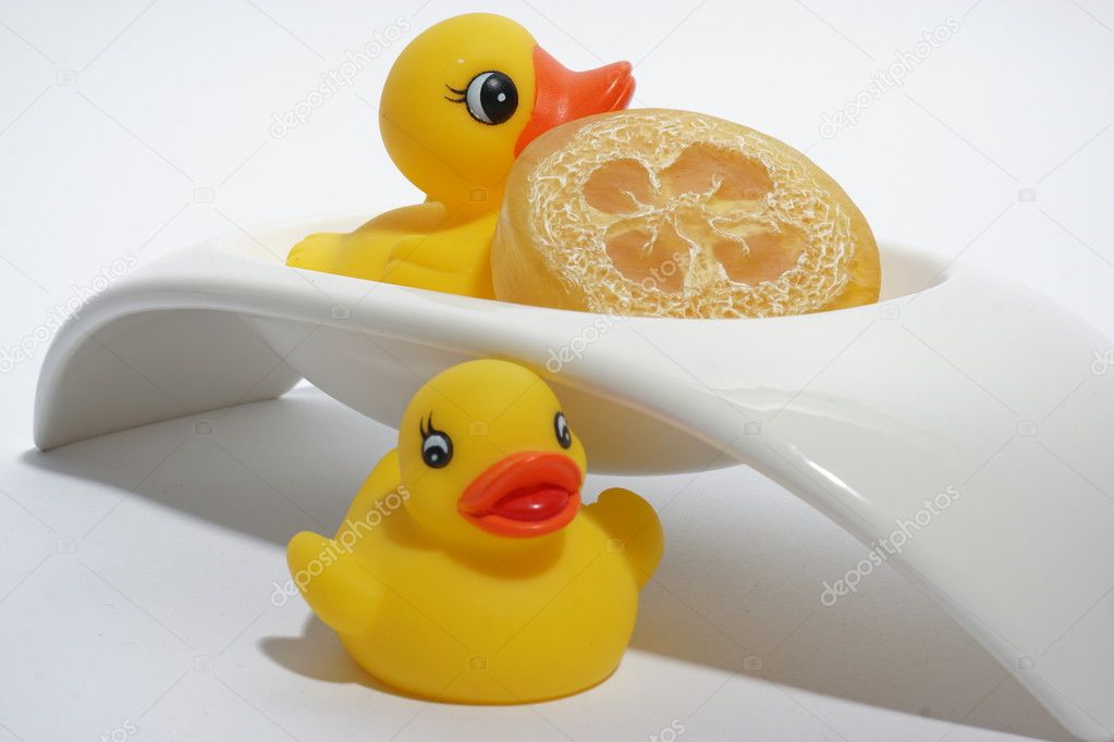 rubber duckies in a soap bowl