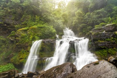 Tad Sua waterfall, A big waterfall in deep forest at Bolaven Plateau clipart