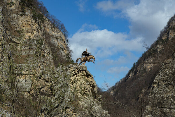 Monument to St. George on a rock.