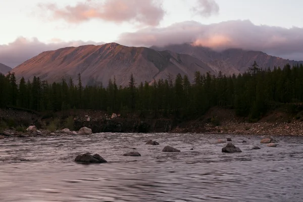 Mountain river and peak in the sunset light. — Stock Photo, Image