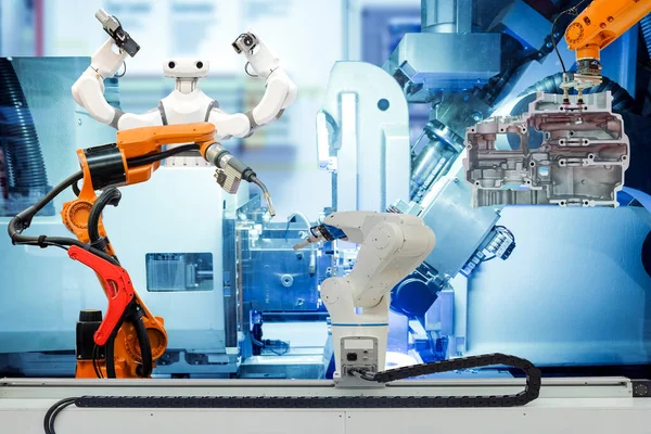 Endüstriyel robot kaynaklama, robot yakalama ve akıllı robot akıllı fabrika üzerinde çalışıyor, mavi tonlu arka plan, endüstri 4.0 ve teknoloji, akıllı robotik takım çalışması kavramı üzerinde çalışıyor.