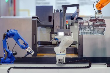 Endüstriyel robotik sürükleyici ve robotik 3D tarama CNC 'de motorsiklet parçalarıyla birlikte akıllı fabrika, endüstri 4.0 ve yapay zeka üzerine çalışan takım çalışması, gelecekteki konsept yerine insan yerine robot işi.