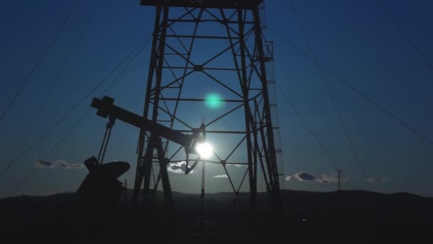 Silhouettes Oil Wells Pumping Sunset — Stock Video