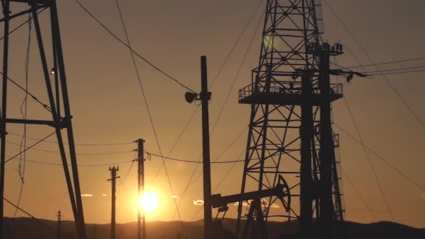 Silhouettes Oil Wells Pumping Sunset — Stock Video