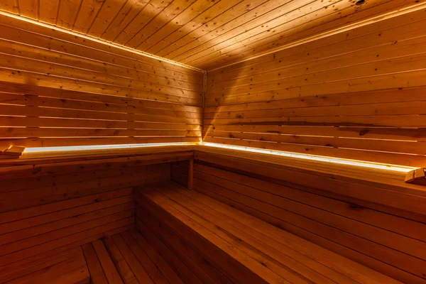 Boş, boş, ısıtmalı sauna Himalaya tuğla duvarı, saunada ahşap duvarlar, Finlandiya saunası, Himalaya tuzu yorucu spor eğitiminden sonra iyileşme.