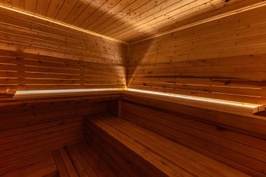 Boş, boş, ısıtmalı sauna Himalaya tuğla duvarı, saunada ahşap duvarlar, Finlandiya saunası, Himalaya tuzu yorucu spor eğitiminden sonra iyileşme.