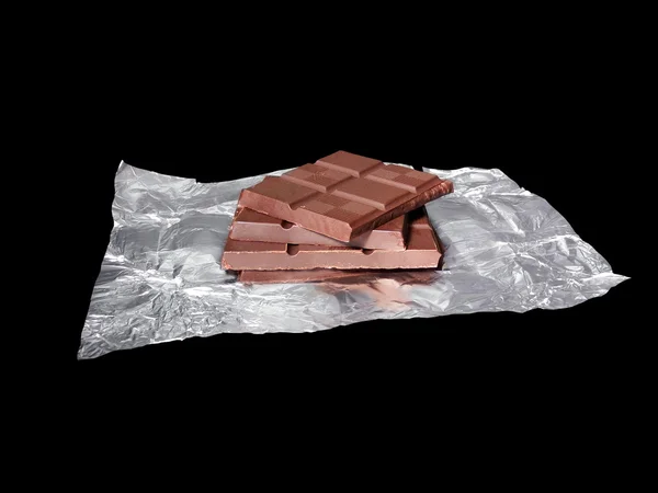 Chocolate bars and the aluminum foil — Stock Photo, Image