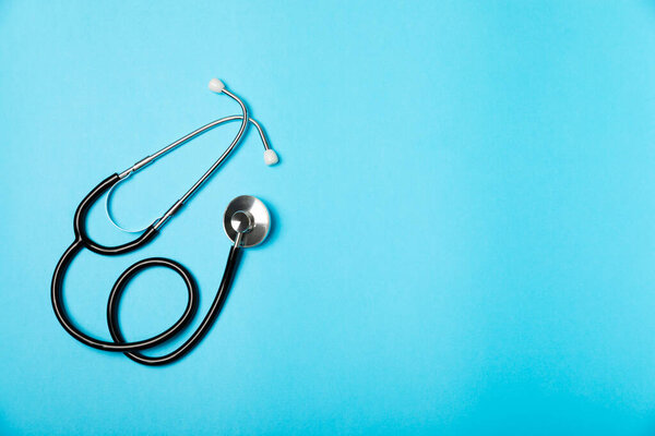 Stethoscope on the table. Medical instrument. Medical concept. Healthcare. Health Day.Doctor equipment. Cardiology. Heart disease.Lung diagnostics.Diagnosis of respiratory inflammation.Space for text