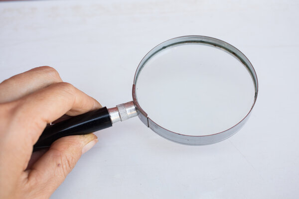Magnifying glass on the table