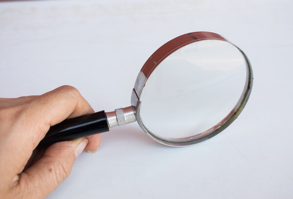 Magnifying glass on the table