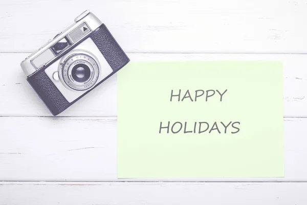 Fotocamera vintage con nota Happy Holiday — Foto Stock