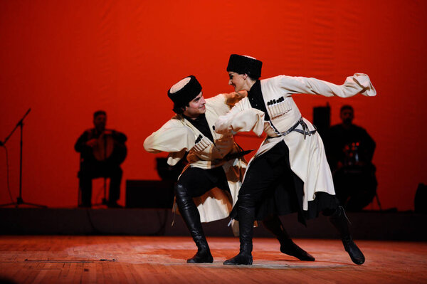 Dancers performing native Georgian dance. Sukhishvili, The Georgian National Ballet. March 10,2018. Kiev, Ukraine